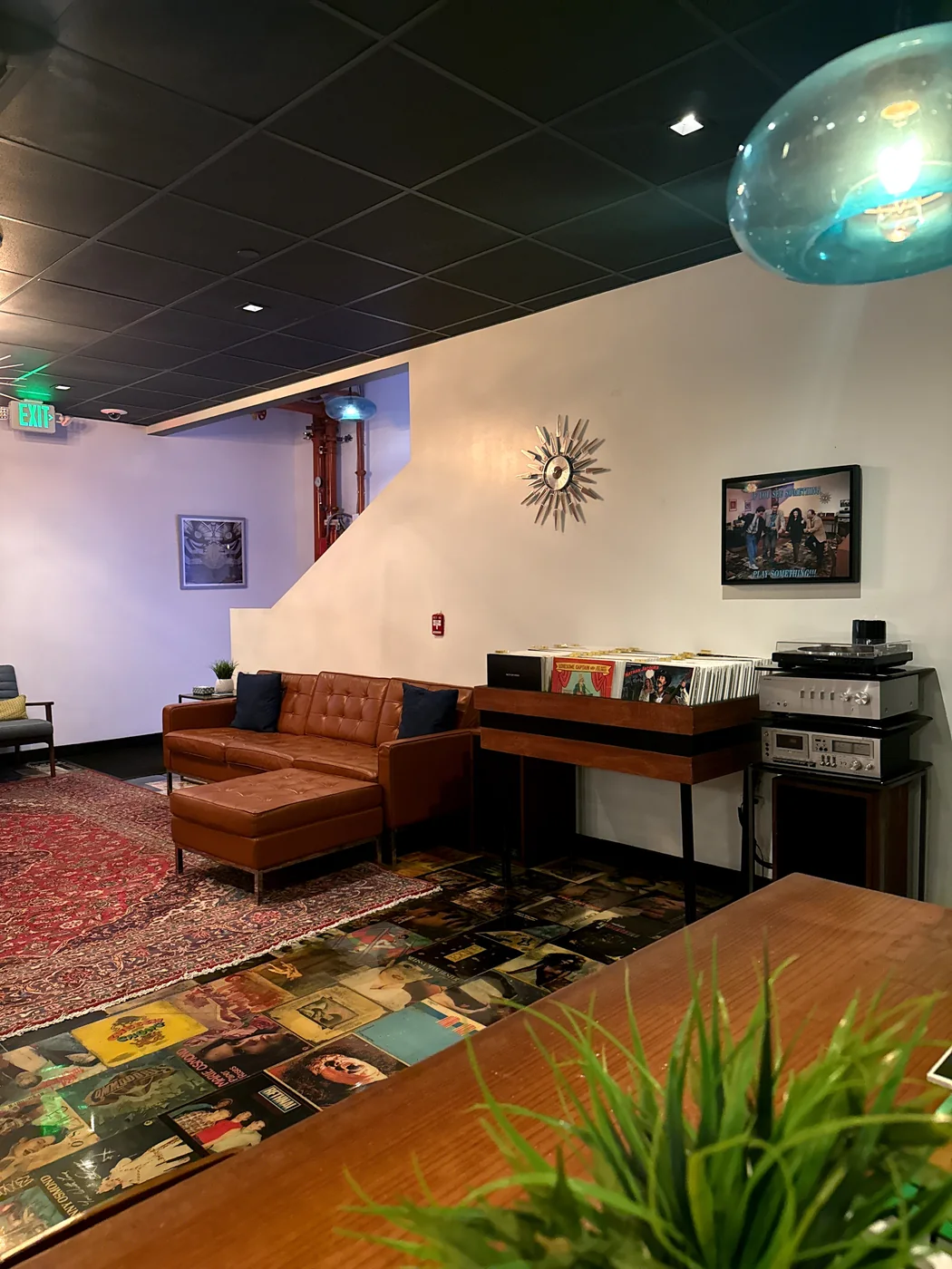 The Highland Park lounge with leather seating, records and a turntable