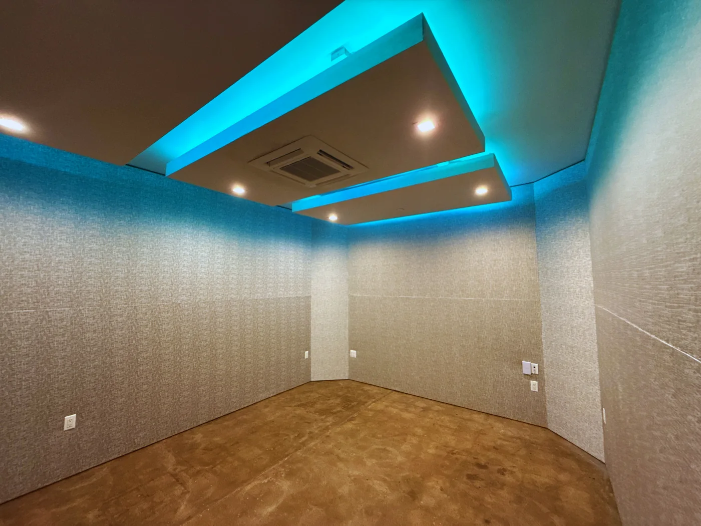 A second Highland Park studio control room with acoustic ceiling clouds and blue cove lighting
